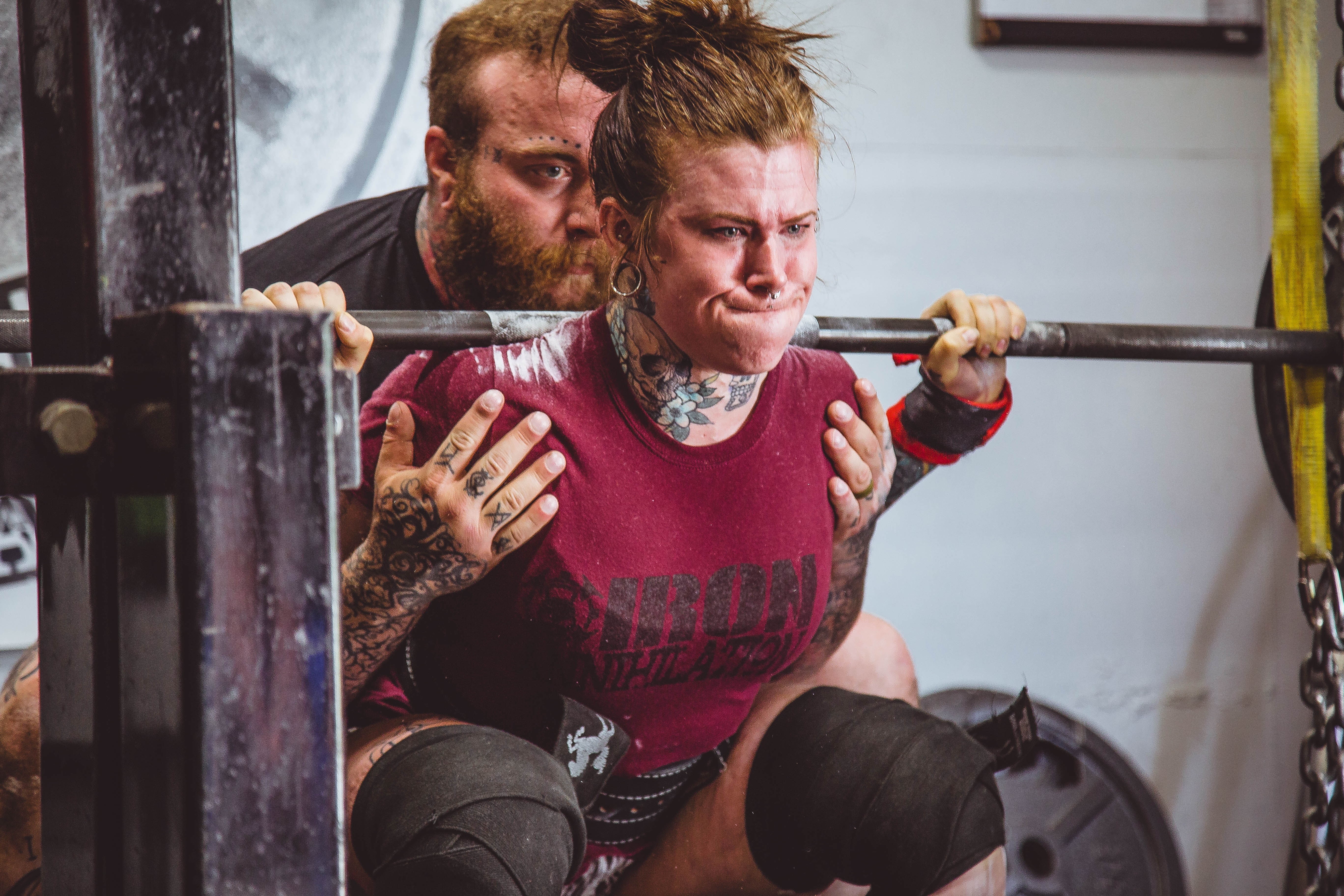 Woman squatting heavy